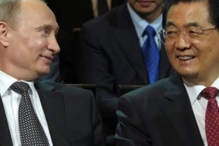 Vladimir Putin participou de encontros com o primeiro-ministro chinês, Wen Jiabao, e com o vice-presidente Xi Jinping, muito provavelmente futuro número um da China (©AFP / Alexey Druzhinin)