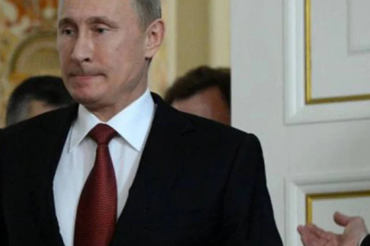 Vladimir Putin com o primeiro-ministro iraquiano, Nuri al-Maliki: o avião sírio foi obrigado a pousar em Ancara na quarta-feira à tarde sob a suspeita de transportar armas (©AFP / Kirill Kudryavtsev)