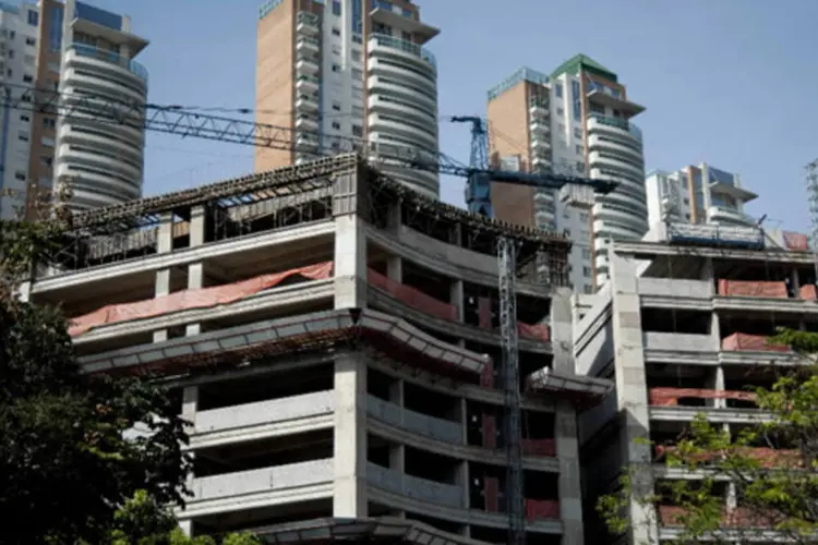 
	Pr&eacute;dios em constru&ccedil;&atilde;o em S&atilde;o Paulo: maior avan&ccedil;o do IPC-S veio do grupo Habita&ccedil;&atilde;o, com acelera&ccedil;&atilde;o de 0,63%
 (Paulo Fridman/Bloomberg)