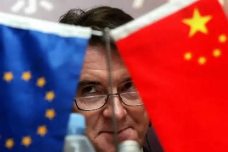 
	Bandeiras da Uni&atilde;o Europeia e da China, em reuni&atilde;o da OMC: esta nova etapa significa que um acordo amig&aacute;vel n&atilde;o foi alcan&ccedil;ado entre ambas as partes
 (Jason Lee / Boomerang)