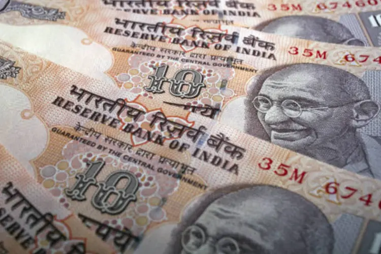 
	Rupia moeda da &Iacute;ndia:&nbsp;moeda indiana perdeu cerca de 20 por cento de seu valor nos oito primeiros meses do ano
 (Prashanth Vishwanathan)