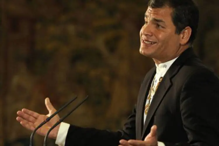 Rafael Correa, presidente do Equador, que não confirmou presença na Cúpula das Américas, em coletiva em Madri, dia 17 (©AFP / Dani Pozo)
