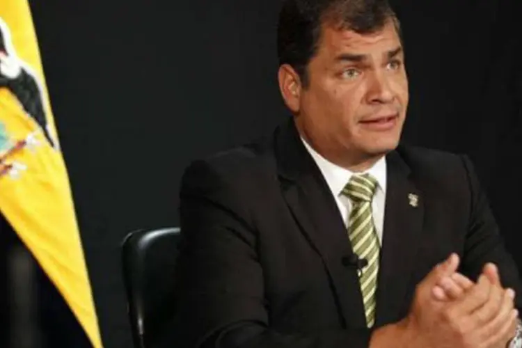 O presidente equatoriano Rafael Correa: o presidente lidera as intenções de voto com 61,7%, contra 12,6% do banqueiro Guillermo Lasso (©AFP / Ho)