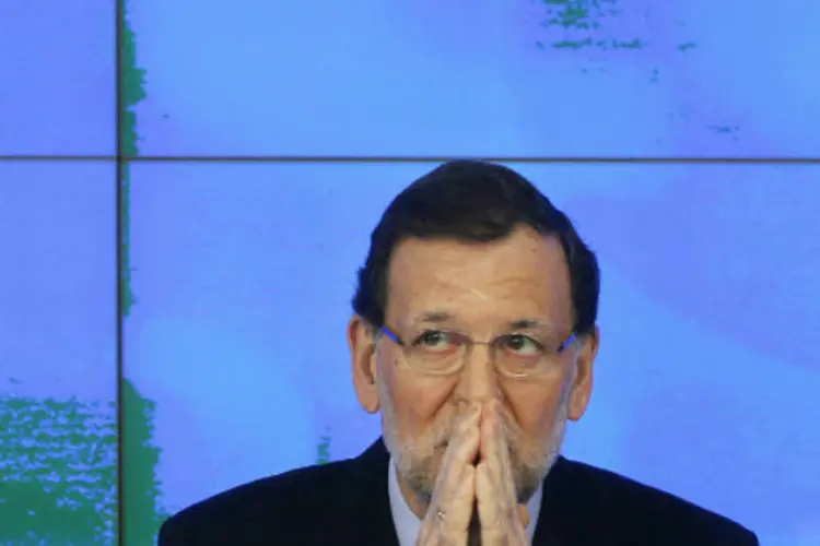 
	Mariano Rajoy: &quot;o n&uacute;mero de redu&ccedil;&atilde;o teve que ser maior, mas o compromisso foi cumprido&quot;, disse&nbsp;
 (REUTERS/Susana Vera)