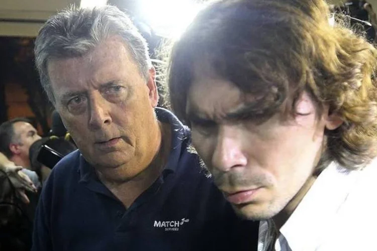 Ray Whelan, executivo da Match Services, chega a delegacia após ser preso na segunda-feira
 (Reuters)