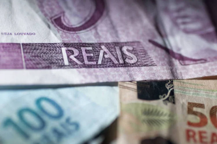 
	Dinheiro: segundo o IBGE, o valor &eacute; duas vezes maior que o registrado no segundo colocado no ranking nacional, S&atilde;o Paulo, que foi R$ 32.449
 (Andrew Harrer/Bloomberg)