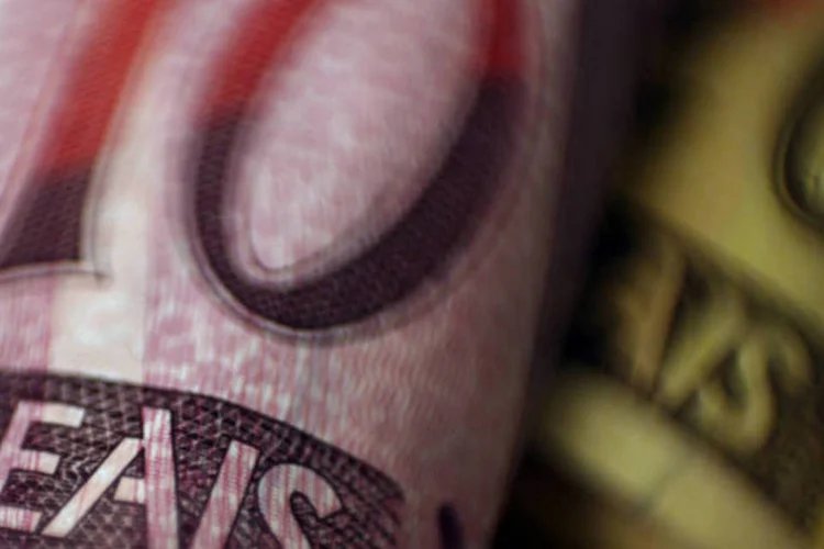 
	Dinheiro: antecipa&ccedil;&atilde;o do pagamento da metade do 13&ordm;&nbsp;come&ccedil;ar&aacute; a ser paga no pr&oacute;ximo dia 26
 (Dado Galdieri/Bloomberg)