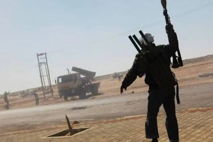 Rebelde líbio: OIM pretende retirar até 8 mil trabalhadores estrangeiros do país (Chris Hondros/Getty Images)