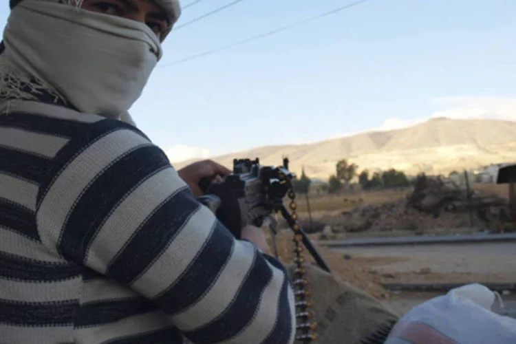 
	Rebelde s&iacute;rio em Damasco: &quot;Bashar al-Assad perdeu legitimidade e deve afastar-se para permitir um processo &#39;sustent&aacute;vel de transi&ccedil;&atilde;o pol&iacute;tica&#39;&quot;, disse texto das pot&ecirc;ncias
 (REUTERS)