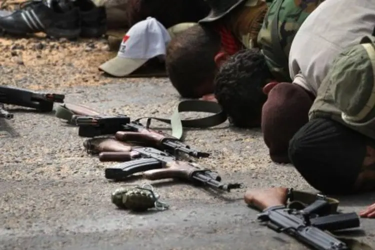 Rebeldes e armas na Líbia (John Moore/Getty Images)