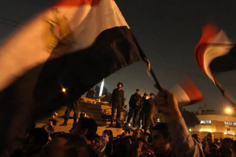 
	Protestos no Egito: revolta por causa da Constitui&ccedil;&atilde;o levou o presidente a excluir o aumento de impostos, visto como parte de um programa do FMI
 (Patrick Baz/AFP)
