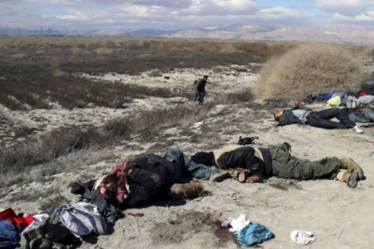 
	Corpos de rebeldes islamitas nos arredores de Damasco, na S&iacute;ria
 (Sana/Handout via Reuters)