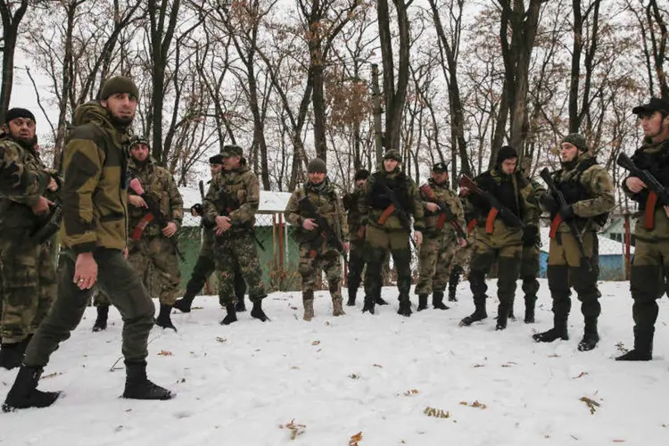 
	Rebeldes em Donetsk: conflito armado no leste ucraniano deixou mais de 5000 mortos
 (Maxim Shemetov/Reuters)