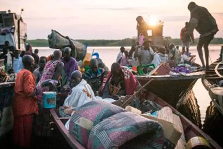 Refugiados do Sudão do Sul em 9 de janeiro de 2014 no campo de refugiados de Minkammen (Nichole Sobecki/AFP)
