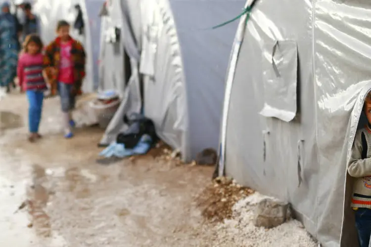 
	Refugiados: um em cada dez civis falecidos era uma crian&ccedil;a
 (Kai Pfaffenbach/Reuters)