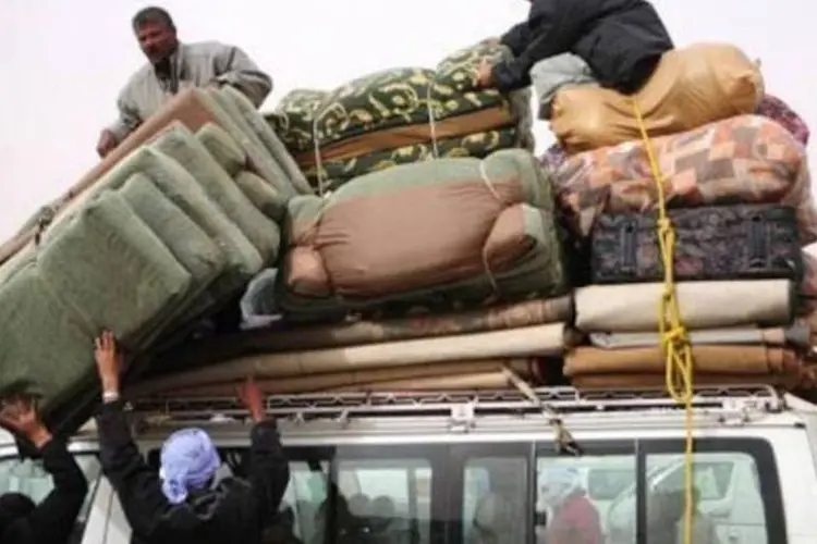 Egípcios deixam a Líbia: EUA prometeram US$ 10 milhões para ajudar (AFP)