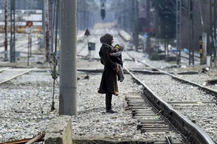 
	Refugiados: o governo endureceu a pol&iacute;tica de asilo desde agosto com reformas como a pol&ecirc;mica proposta para confiscar pertences dos migrantes
 (Roberta Atanasovski / AFP)