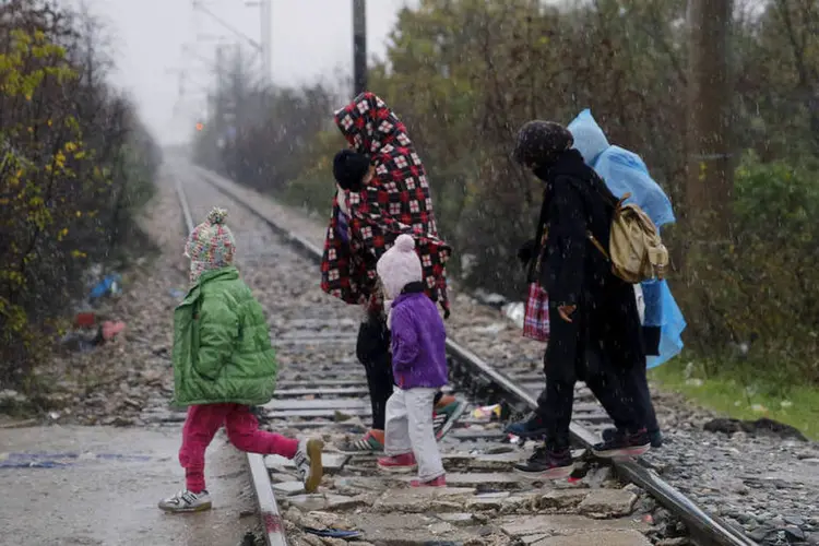 
	Refugiados: o saldo positivo de imigrantes foi de 78.410 pessoas, o que representa 77% do aumento populacional total
 (Yannis Behrakis / Reuters)