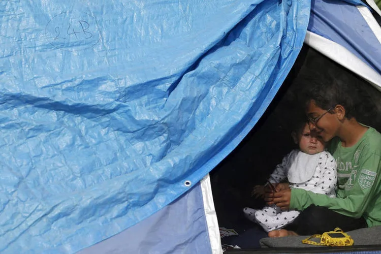 
	Refugiados: alguns deputados conservadores discordaram do partido, argumentando que &quot;tempos excepcionais requerem medidas excepcionais&quot;
 (Stoyan Nenov / Reuters)