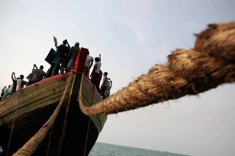 
	Refugiados na Indon&eacute;sia: &quot;Nos deram o dinheiro para transportar os migrantes de volta &agrave; Indon&eacute;sia&quot;
 (Ulet Ifansasti / Getty Images)