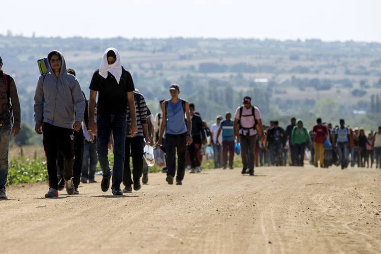 
	Refugiados: isso poder&aacute; ampliar a produ&ccedil;&atilde;o potencial em cerca de 0,5% a m&eacute;dio prazo
 (Reuters / Marko Djurica)