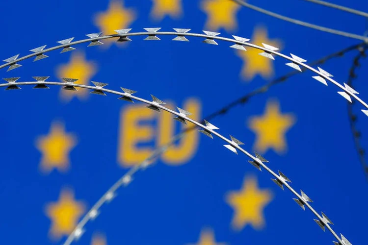 
	Refugiados: at&eacute; agora, a legisla&ccedil;&atilde;o croata s&oacute; punia quem ajudasse os imigrantes a entrar ou transitar ilegalmente pelo pa&iacute;s
 (Srdjan Zivulovic / Reuters)