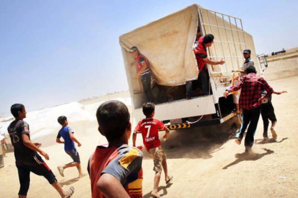 EI recruta oferecendo comida, dizem refugiados de Falluja
