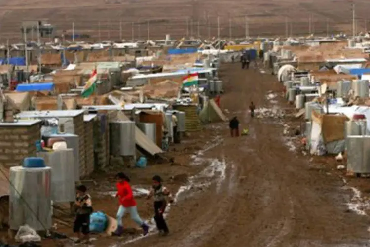 
	Campo de refugiados de Domiz, no Iraque, que abriga curdos s&iacute;rios: 55.685 s&iacute;rios est&atilde;o no pa&iacute;s
 (Safin Hamed/AFP)
