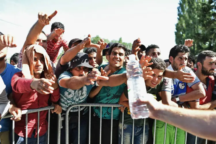 
	Refugiados na Europa: no &uacute;ltimo relat&oacute;rio, o n&uacute;mero previsto era de 350.000 migrantes para 2015
 (Jeff J Mitchell/Getty Images)