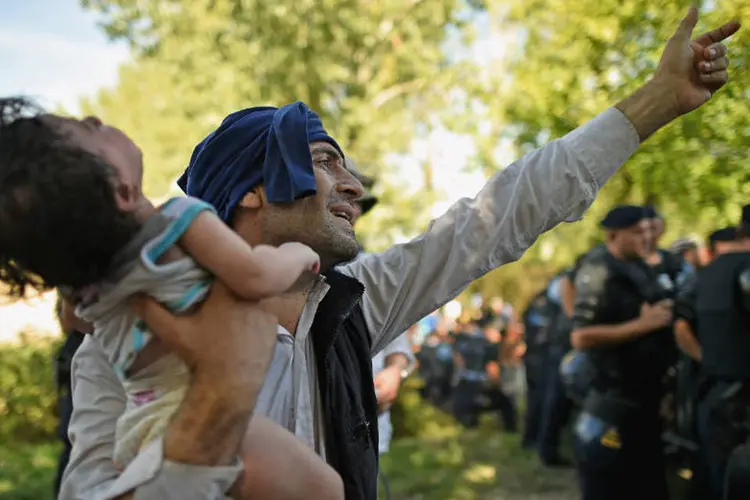 
	Refugiados s&iacute;rios na Cro&aacute;cia: desde quarta-feira, 27 refugiados passaram pelo pa&iacute;s
 (Jeff J Mitchell/Getty Images)