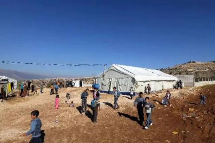 Campo de refugiados no Líbano: mais de 13 milhões de pessoas foram deslocadas pelos conflitos na Síria e no Iraque (Joseph Eid/AFP)