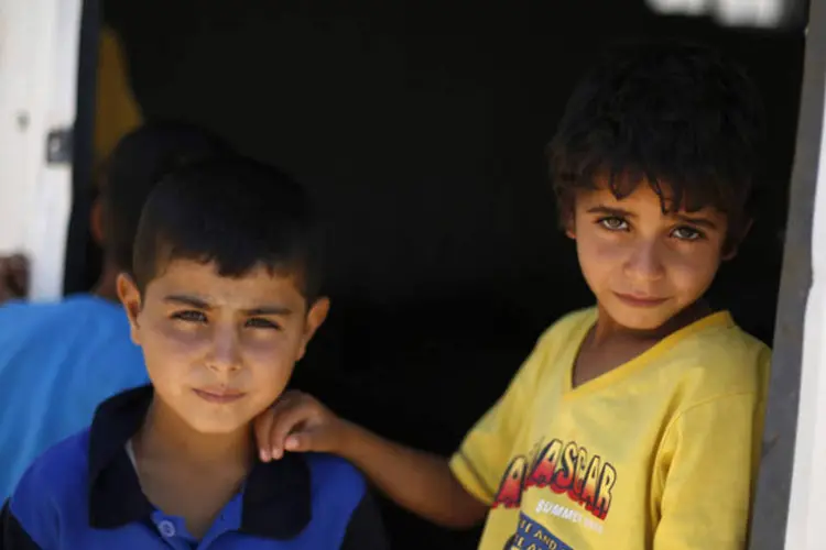 Síria: crianças refugiadas sírias no campo de Azraq, perto de Al Azraq, leste de Amã (Muhammad Hamed/Reuters)
