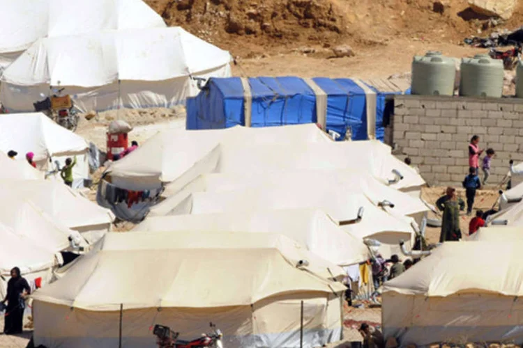 
	Refugiados s&iacute;rios: moradores atacaram membros do campo de refugiados
 (Hassan Abdallah/Reuters)