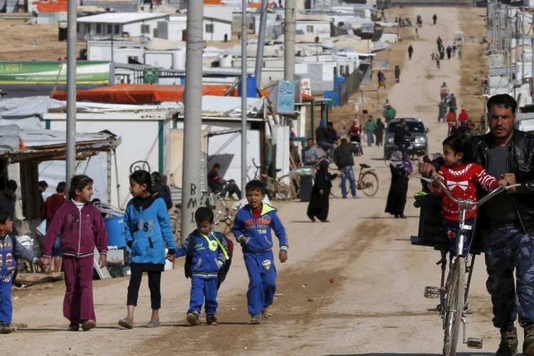 
	Refugiados s&iacute;rios na Jord&acirc;nia: esse n&uacute;mero de refugiados viajar&aacute; aos Estados Unidos antes de 30 de setembro
 (Muhammad Hamed / Reuters)