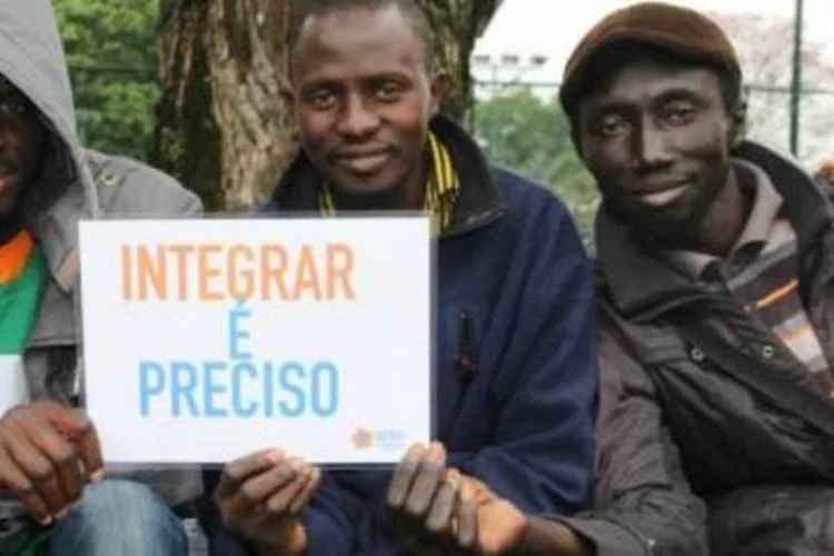 
	Refugiados: cervejaria Tr&oacute;pica doar&aacute; para o Instituto R$ 1 a cada chope vendido entre hoje e 1&ordm; de novembro
 (Reprodução/Adus)
