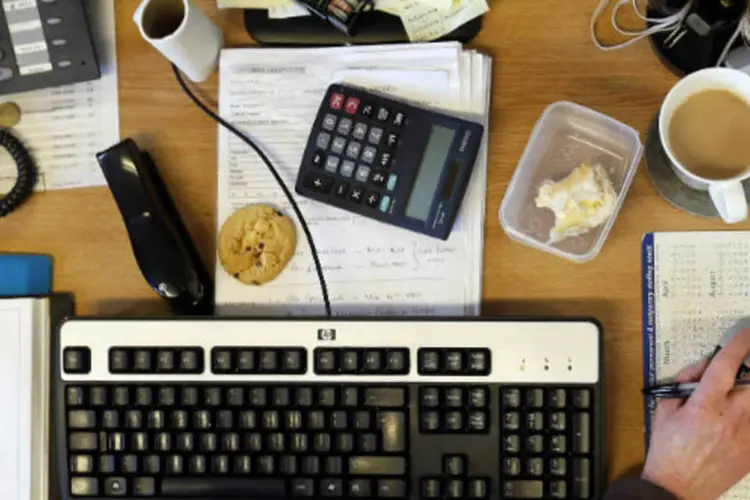 
	Bagun&ccedil;a na mesa de trabalho: um pouco de desorganiza&ccedil;&atilde;o pode estimular a criatividade e te fazer trabalhar melhor.
 (REUTERS/Stefan Wermuth)