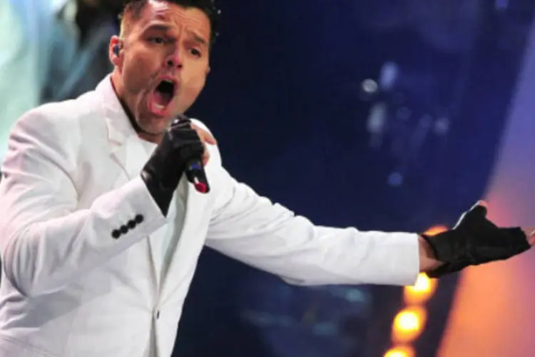 
	Ricky Martin: &quot;N&atilde;o s&oacute; em Porto Rico, mas em todo o mundo, aqui nos Estados Unidos, h&aacute; um n&uacute;mero muito grande de crian&ccedil;as que est&atilde;o se tornando escravas&quot;
 (AFP/Getty Images)