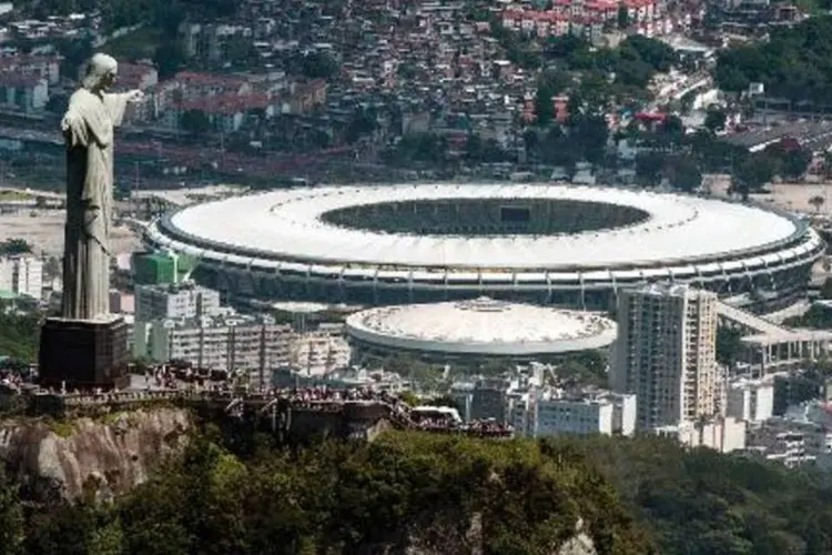 
	Rio de Janeiro: cidade mant&eacute;m o sinal amarelo quanto a realiza&ccedil;&atilde;o de obras, reformas e melhorias de instala&ccedil;&otilde;es esportivas e infra-estrutura geral
 (Yasuyoshi Chiba/AFP)