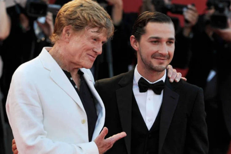 O cineasta Robert Redford chega ao festival de Veneza com Shia LaBeouf : Redford mantém com vigor sua colocação ideológica quando está diante da imprensa (Christine Pettinger/ Getty Images)