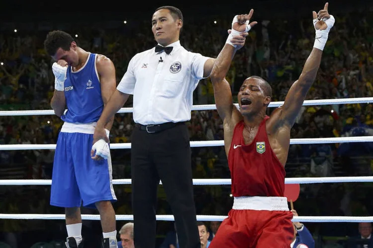
	Robson Concei&ccedil;&atilde;o, medalha de ouro no boxe, dia 16/08/2016
 (Peter Cziborra / Reuters)