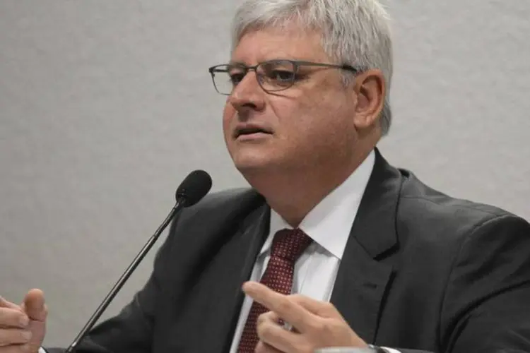
	Rodrigo Janot: Procurador-geral divulga nota oficial ap&oacute;s publica&ccedil;&atilde;o de reportagem que afirma que ele se reunia com empreiteiras envolvidas na Lava Jato para blindar Dilma Rousseff
 (Antonio Cruz/Agência Brasil)