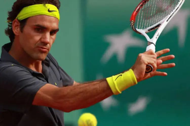 Roger Federer: O número 1 do mundo também entrou em quadra hoje pelo torneio de simples e venceu o francês Julien Benneteau por um duplo 6-2 (Getty Images)