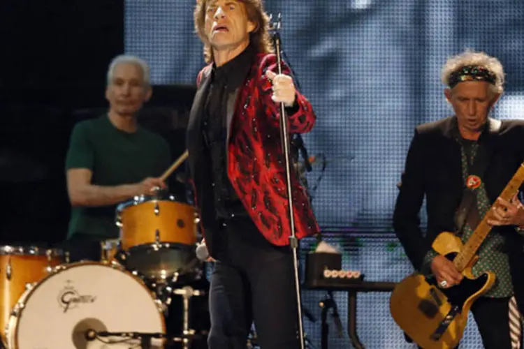 
	Mick Jagger, Charlie Watts e Keith Richards do Rolling Stones durante apresenta&ccedil;&atilde;o: h&aacute; alguns meses, Jagger realizou uma visita &agrave; ilha, sozinho, o que levantou rumores de um poss&iacute;vel show
 (Reuters)