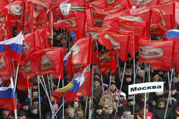 
	Russos protestam em Moscou: Levante em Kiev completou um ano e &eacute; considerado como golpe de Estado pelos manifestantes
 (REUTERS/Sergei Karpukhin)