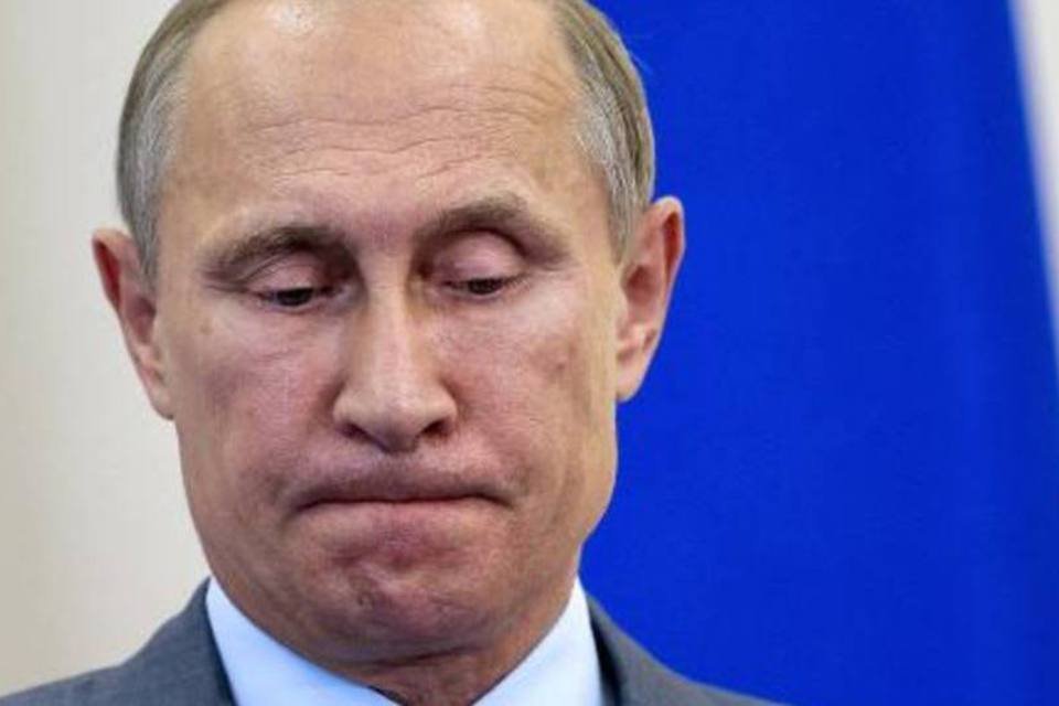 
	Vladimir Putin: R&uacute;ssia enfrenta o isolamento internacional, com sua economia em crise
 (Ivan Sekretarev/AFP)