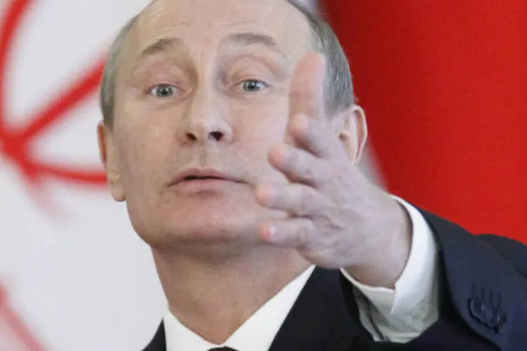 
	O presidente russo, Vladimir Putin: &quot;assim que houver a oportunidade de que ele se desloque para outro lugar, espero que o fa&ccedil;a&quot;, disse
 (REUTERS/Maxim Shemetov)