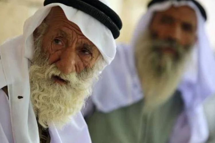 Sacerdote da minoria religiosa Yazidi em um templo no Curdistão (Ahmad al-Rubaye/AFP)