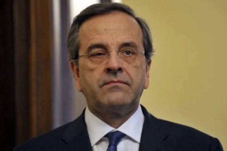 
	Hoje Samaras vai se encontrar com Jean-Claude Juncker, presidente do Eurogrupo
 (Louisa Gouliamaki/AFP)