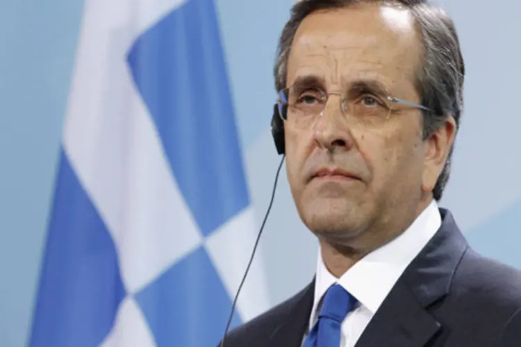 
	Primeiro-ministro grego Antonis Samaras:&quot;O governo passou por um mau momento nos &uacute;ltimos dias, mas se manteve de p&eacute; e continua com determina&ccedil;&atilde;o renovada e uma coopera&ccedil;&atilde;o muito melhor&quot;
 (Andreas Rentz/ Getty Images)