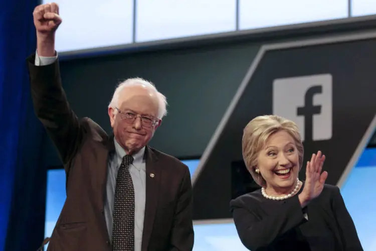 
	Bernie Sanders e Hillary Clinton: pr&eacute;-candidatos democratas disputaram prim&aacute;rias em Kentucky e no Oregon.
 (Javier Galeano / Reuters)